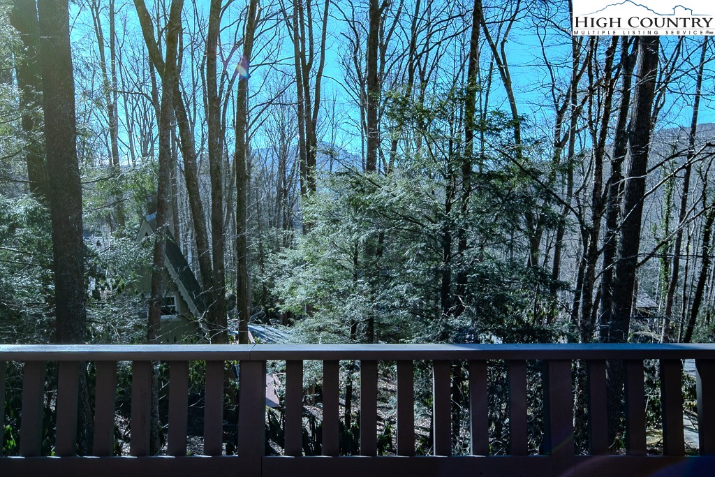 335 Cherry Drive Boone, NC 28607 - Photo 7 of 32 a view of a wooden fence and trees