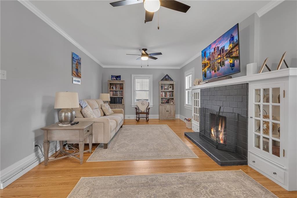 340 4th Street Beaver, PA 15009 - Photo 14 of 42 a living room with furniture and a fireplace