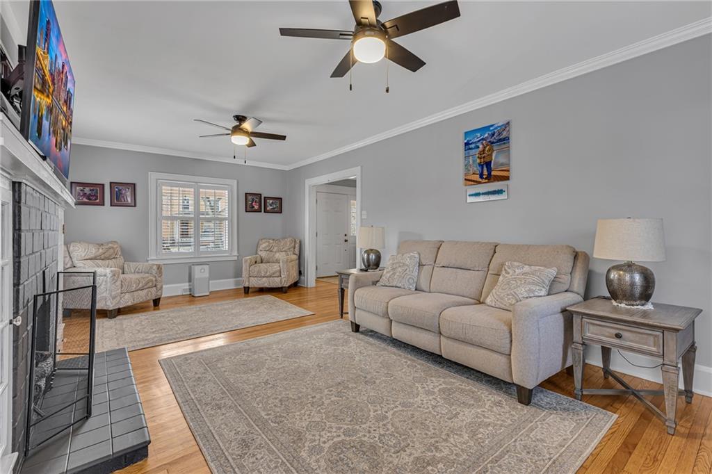 340 4th Street Beaver, PA 15009 - Photo 16 of 42 a living room with furniture and a wooden floor