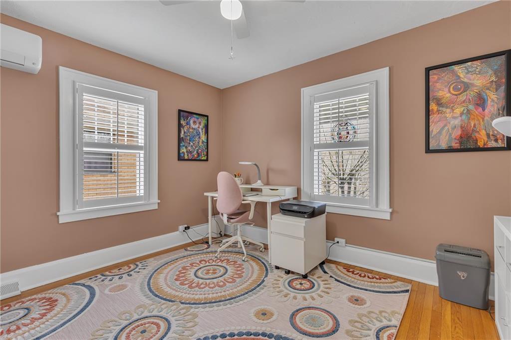 340 4th Street Beaver, PA 15009 - Photo 21 of 42 a view of a workspace with furniture window and wooden floor