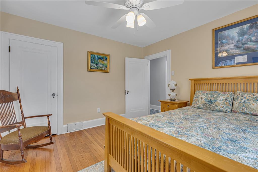 340 4th Street Beaver, PA 15009 - Photo 24 of 42 a bedroom with a bed and a chandelier