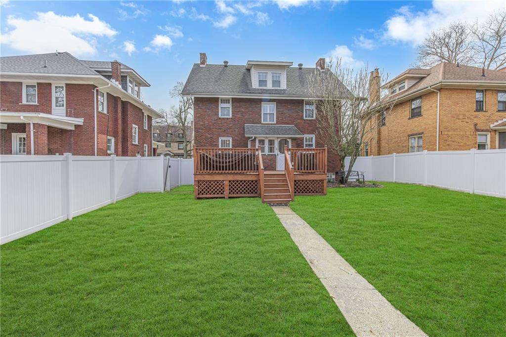 340 4th Street Beaver, PA 15009 - Photo 34 of 42 a front view of a house with a yard and garden