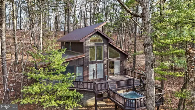 front view of house with a trees