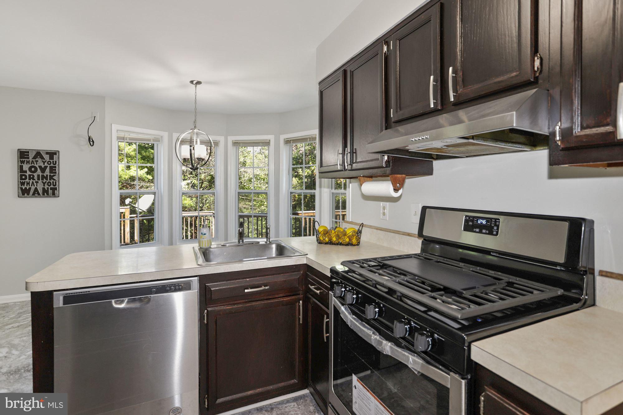 13122 Broadmore Road Silver Spring, MD 20904 - Photo 7 of 45 New Stove and Dishwasher