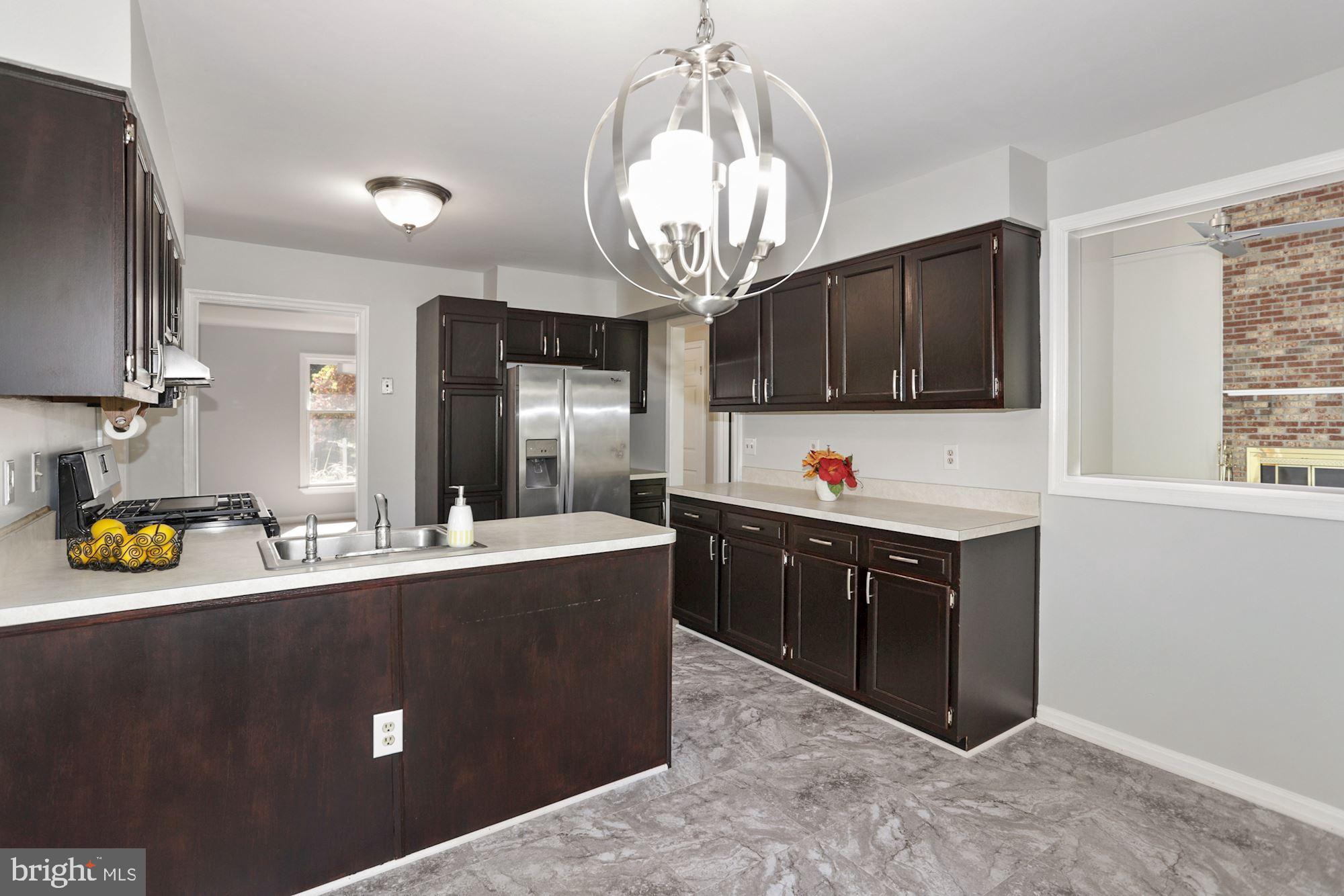 13122 Broadmore Road Silver Spring, MD 20904 - Photo 9 of 45 Kitchen w/View into Family Room