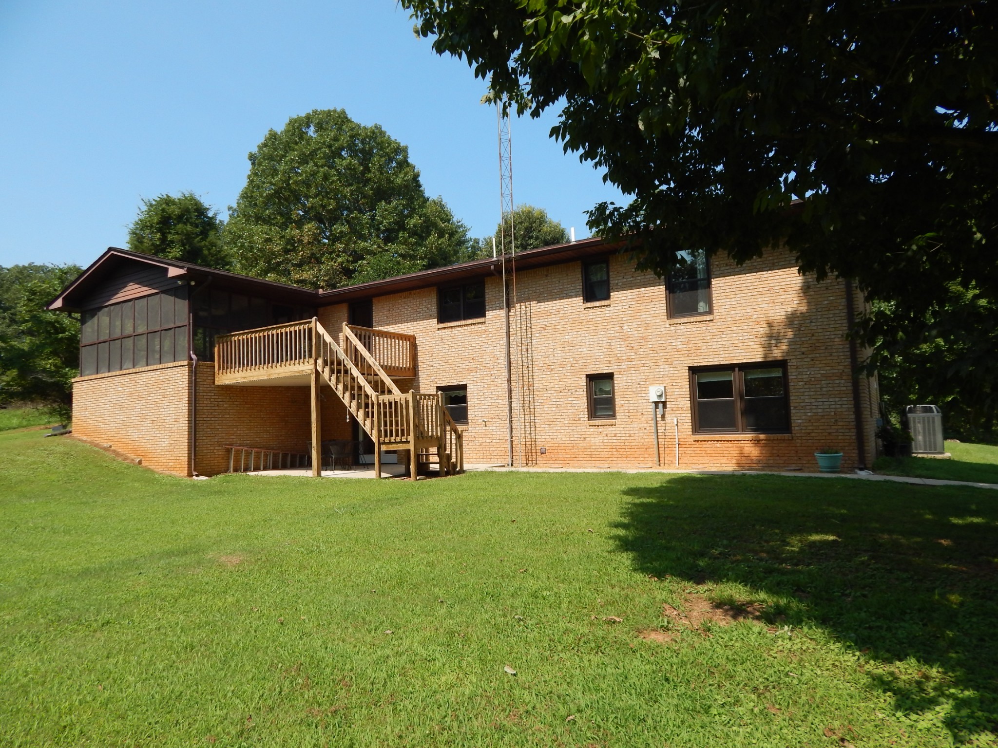 3753 Chisholm Road Iron City, TN 38463 - Photo 2 of 50 a front view of a house with a yard