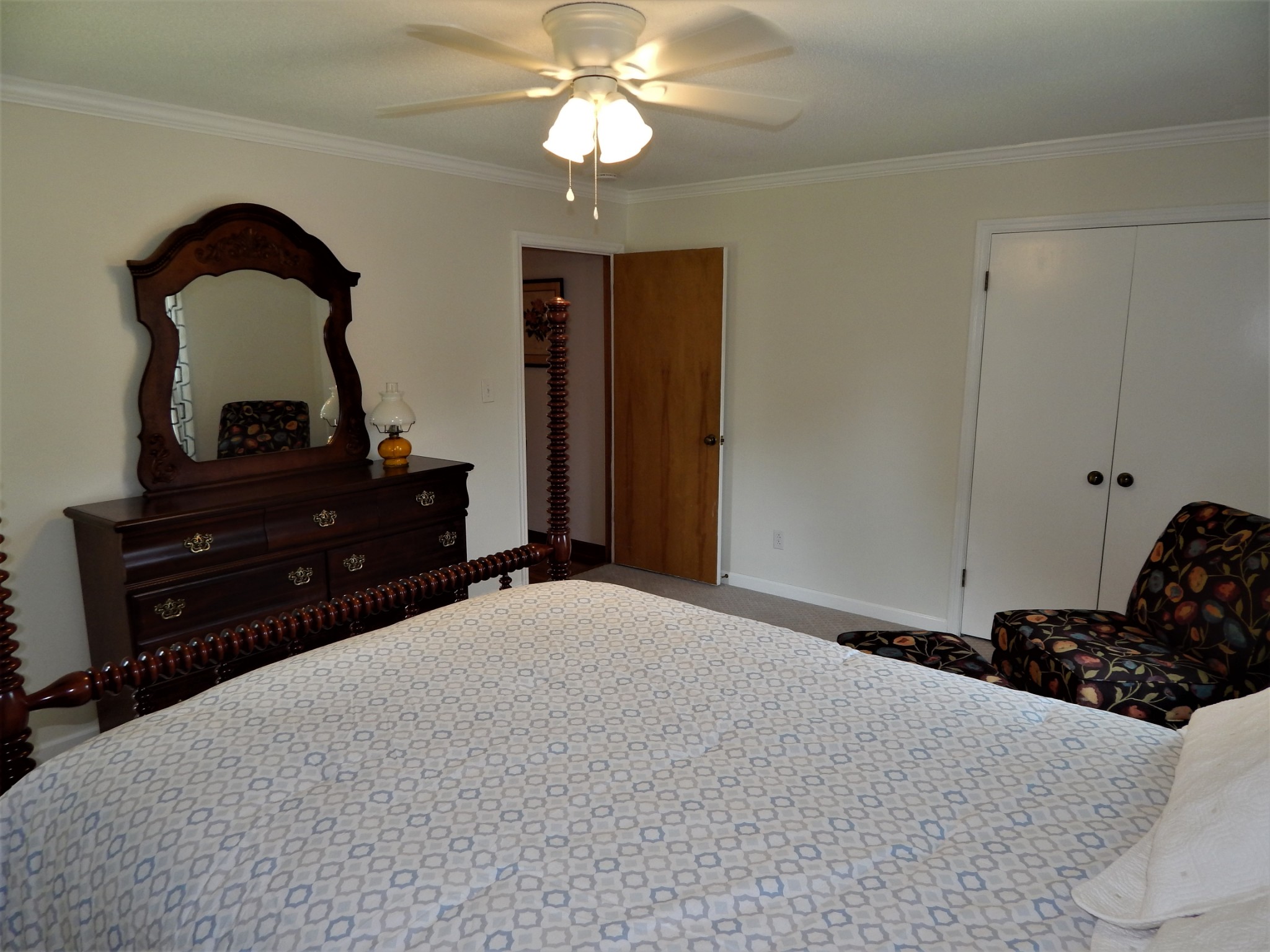 3753 Chisholm Road Iron City, TN 38463 - Photo 19 of 50 a bedroom with a bed and a dresser
