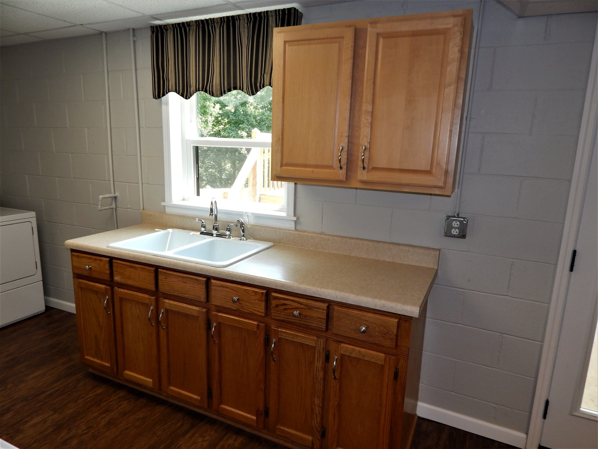 3753 Chisholm Road Iron City, TN 38463 - Photo 24 of 50 a bathroom with a sink and a window