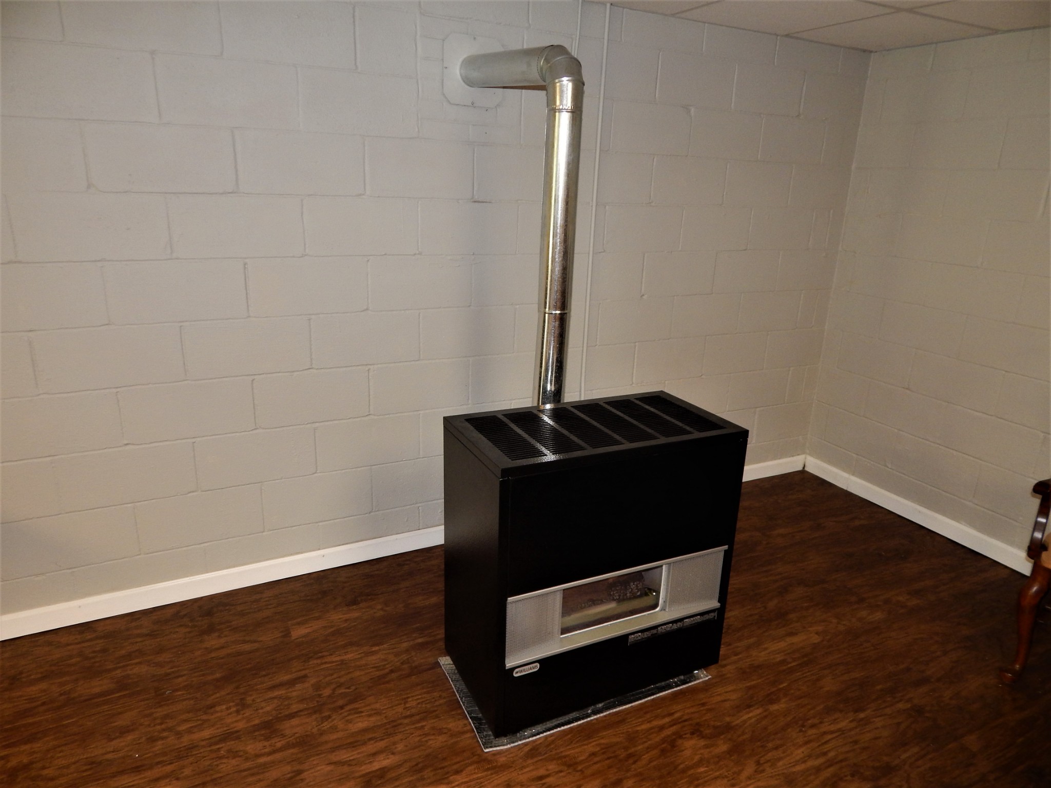 3753 Chisholm Road Iron City, TN 38463 - Photo 26 of 50 a room with a desk and wooden floor