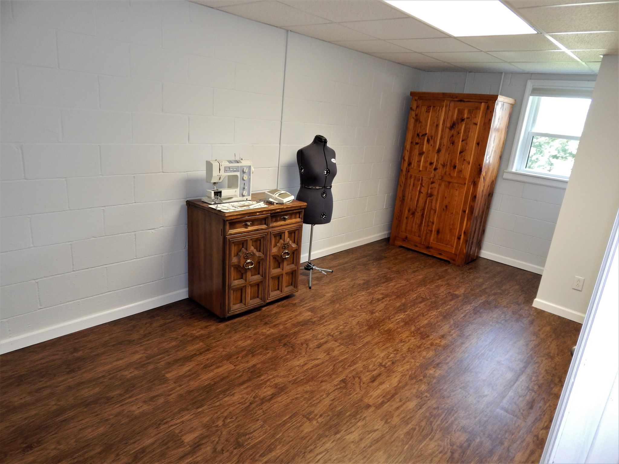 3753 Chisholm Road Iron City, TN 38463 - Photo 30 of 50 a room with furniture and wooden floor