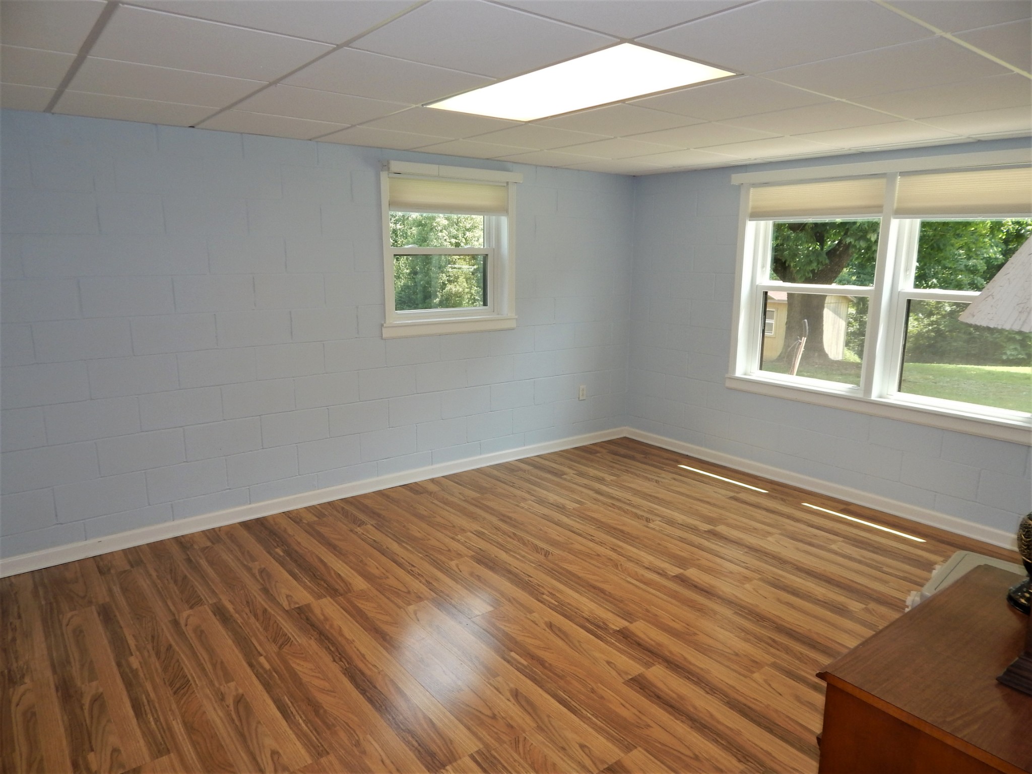 3753 Chisholm Road Iron City, TN 38463 - Photo 34 of 50 an empty room with wooden floor and windows