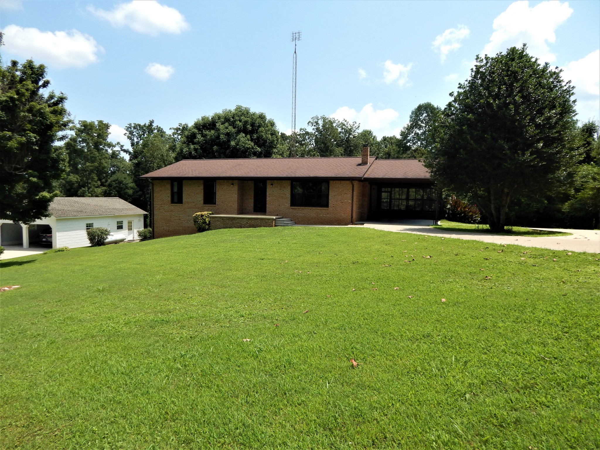 3753 Chisholm Road Iron City, TN 38463 - Photo 6 of 50 a view of a house with a yard