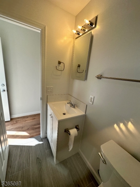 16 Colfax Street, Unit 4 Raritan, NJ 08869 - Photo 13 of 15 a bathroom with a tub sink and mirror