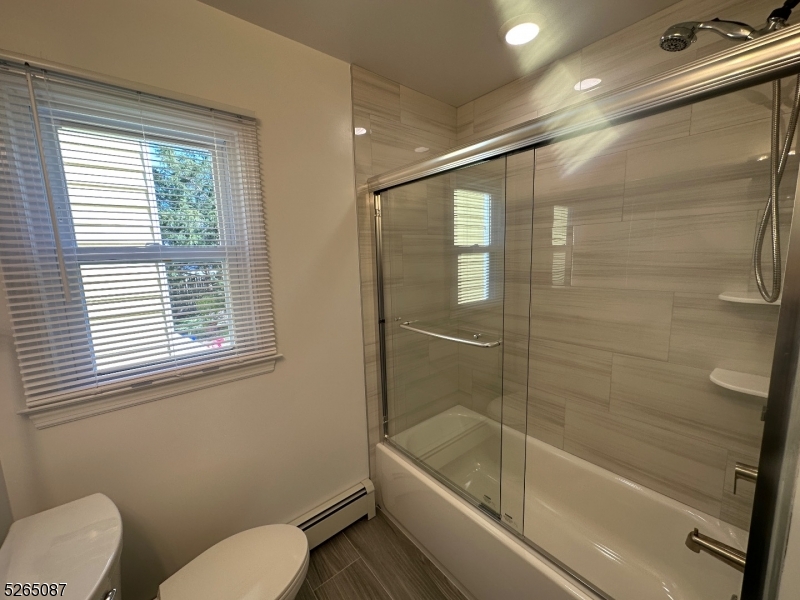 16 Colfax Street, Unit 4 Raritan, NJ 08869 - Photo 15 of 15 a bathroom with a toilet and a bathtub