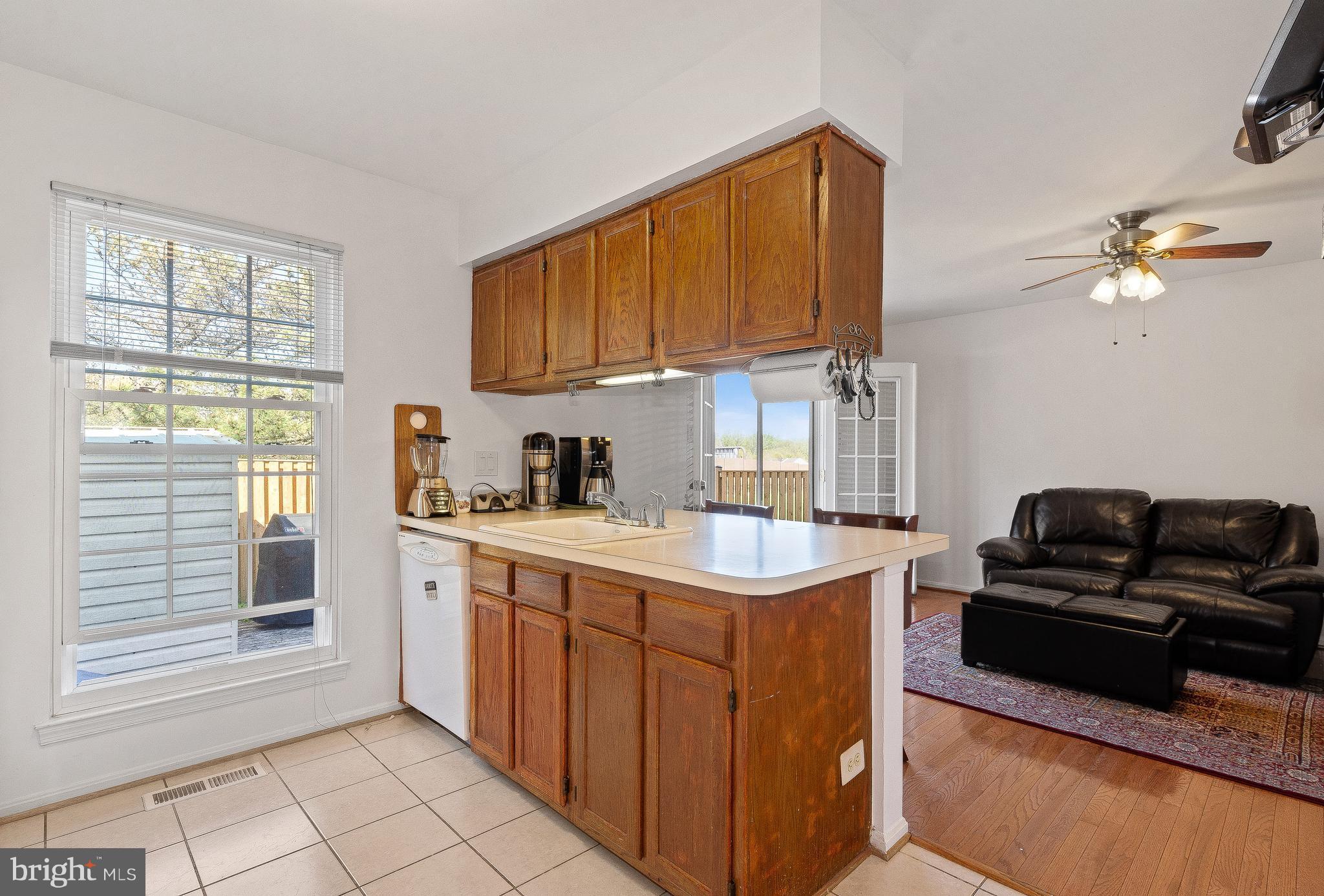 15113 Callohan Court Silver Spring, MD 20906 - Photo 12 of 30 COUNTRY KITCHEN OPEN TO FAMILY ROOM