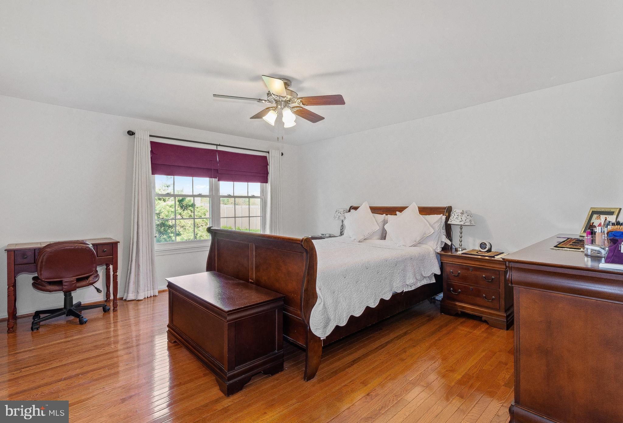 15113 Callohan Court Silver Spring, MD 20906 - Photo 16 of 30 MASTER BEDROOM W/HARDWOOD FLOORS