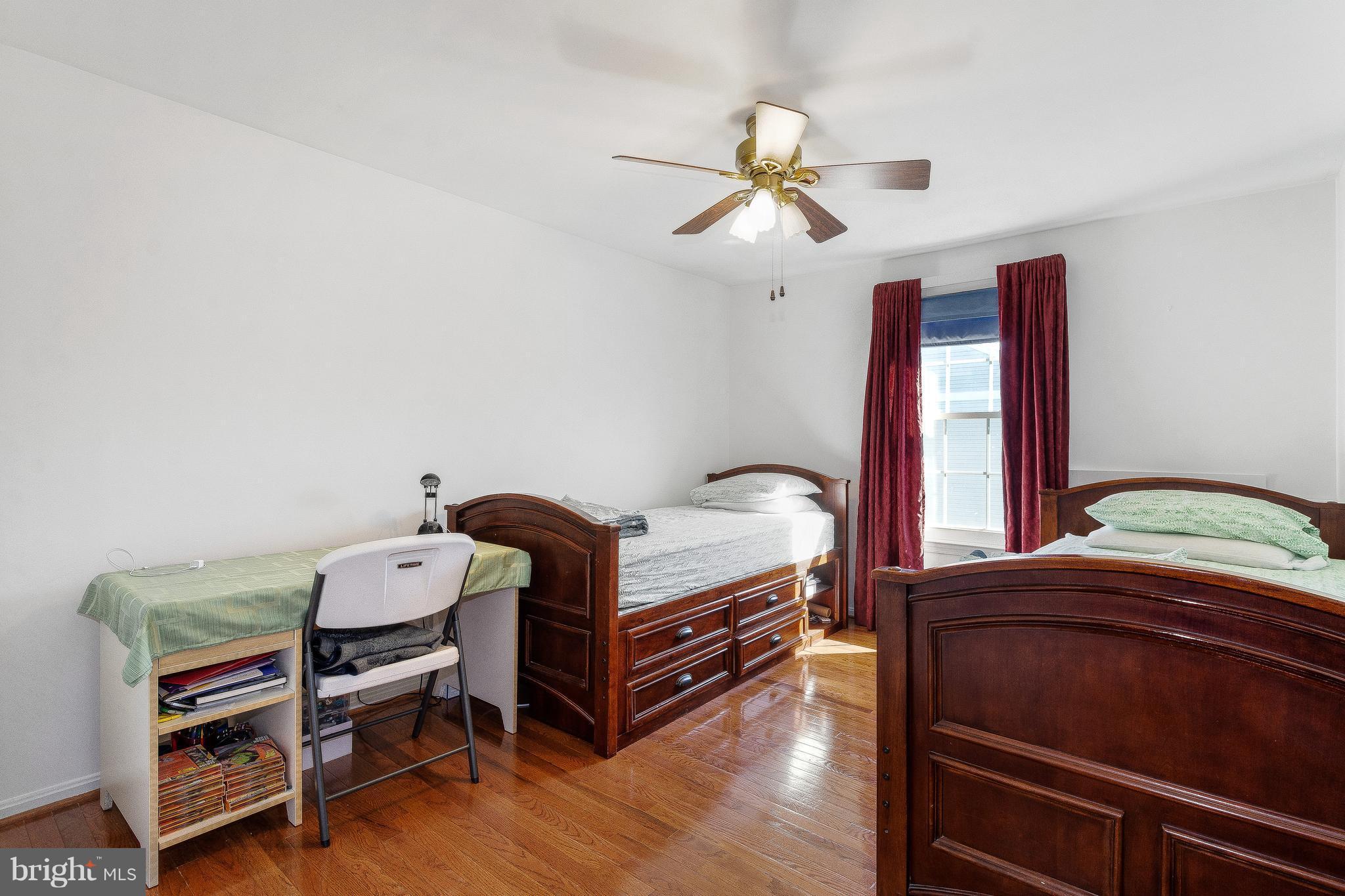15113 Callohan Court Silver Spring, MD 20906 - Photo 21 of 30 3RD BEDROOM W/HARDWOOD FLOORS