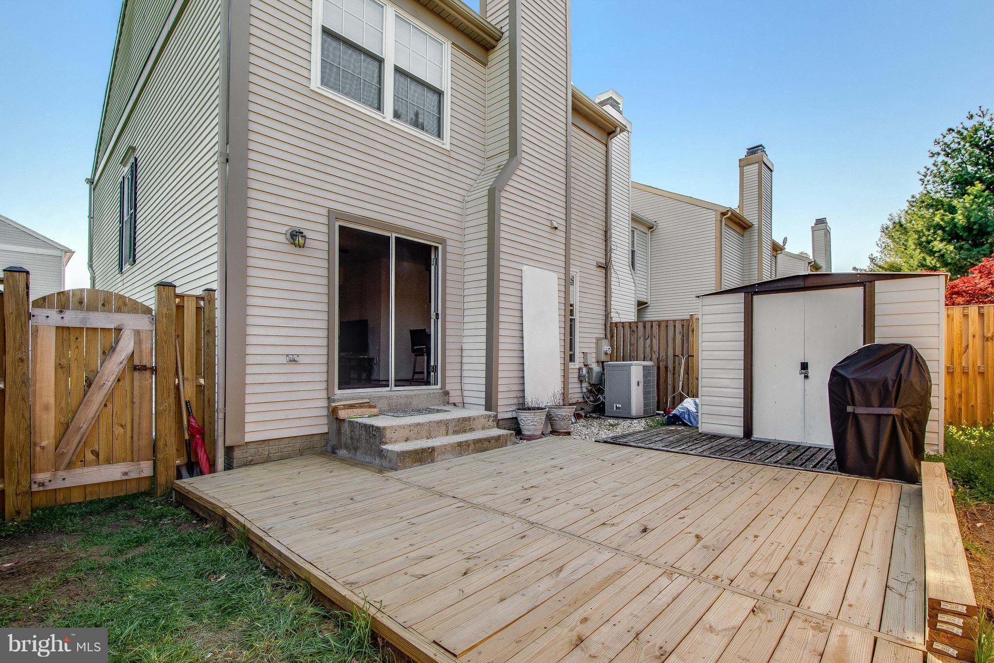 15113 Callohan Court Silver Spring, MD 20906 - Photo 28 of 30 BACK OF HOME W/STORAGE SHED
