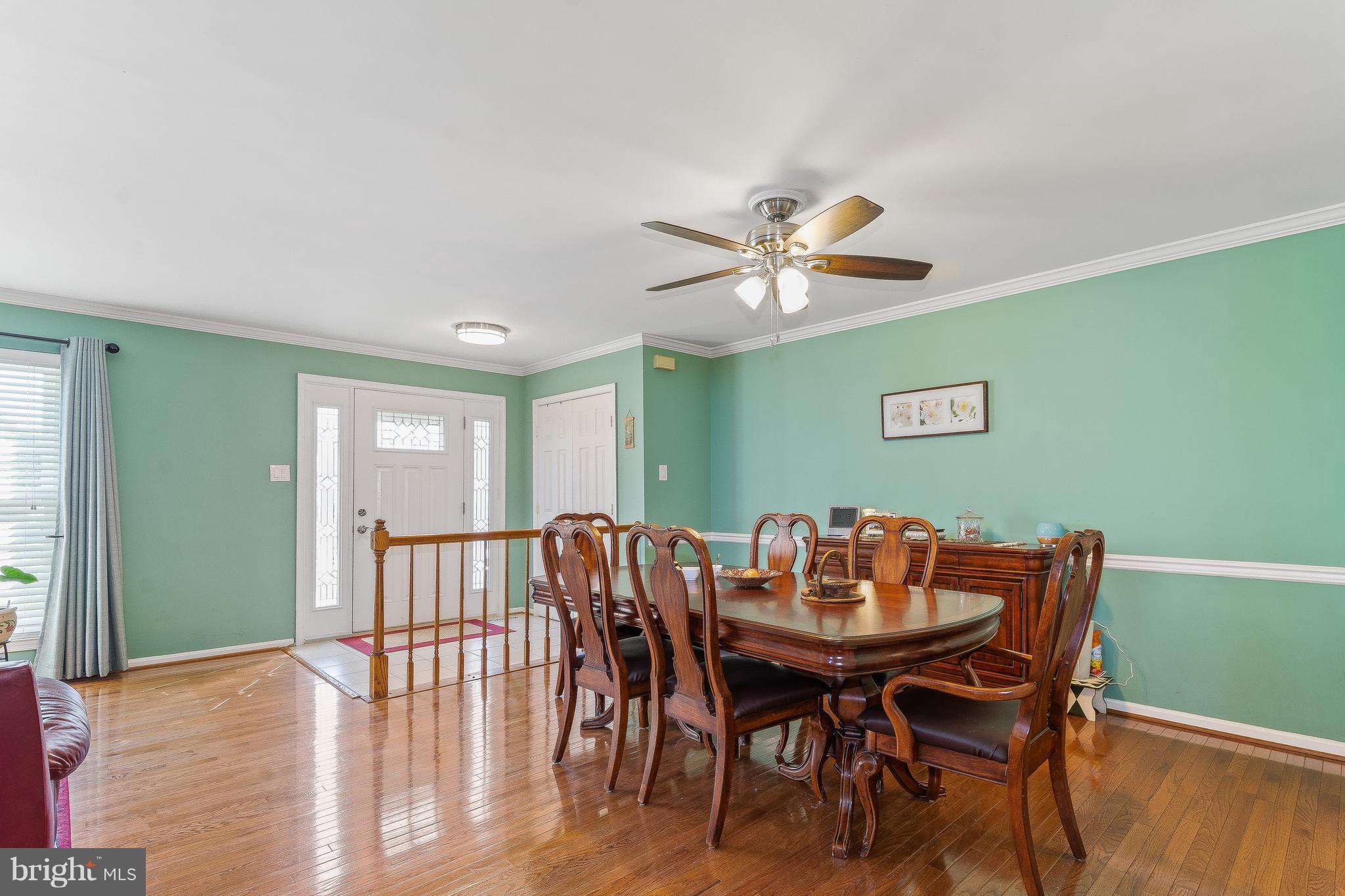 15113 Callohan Court Silver Spring, MD 20906 - Photo 5 of 30 ELEGANT DINING ROOM W/CROWN & CHAIR MOLDING