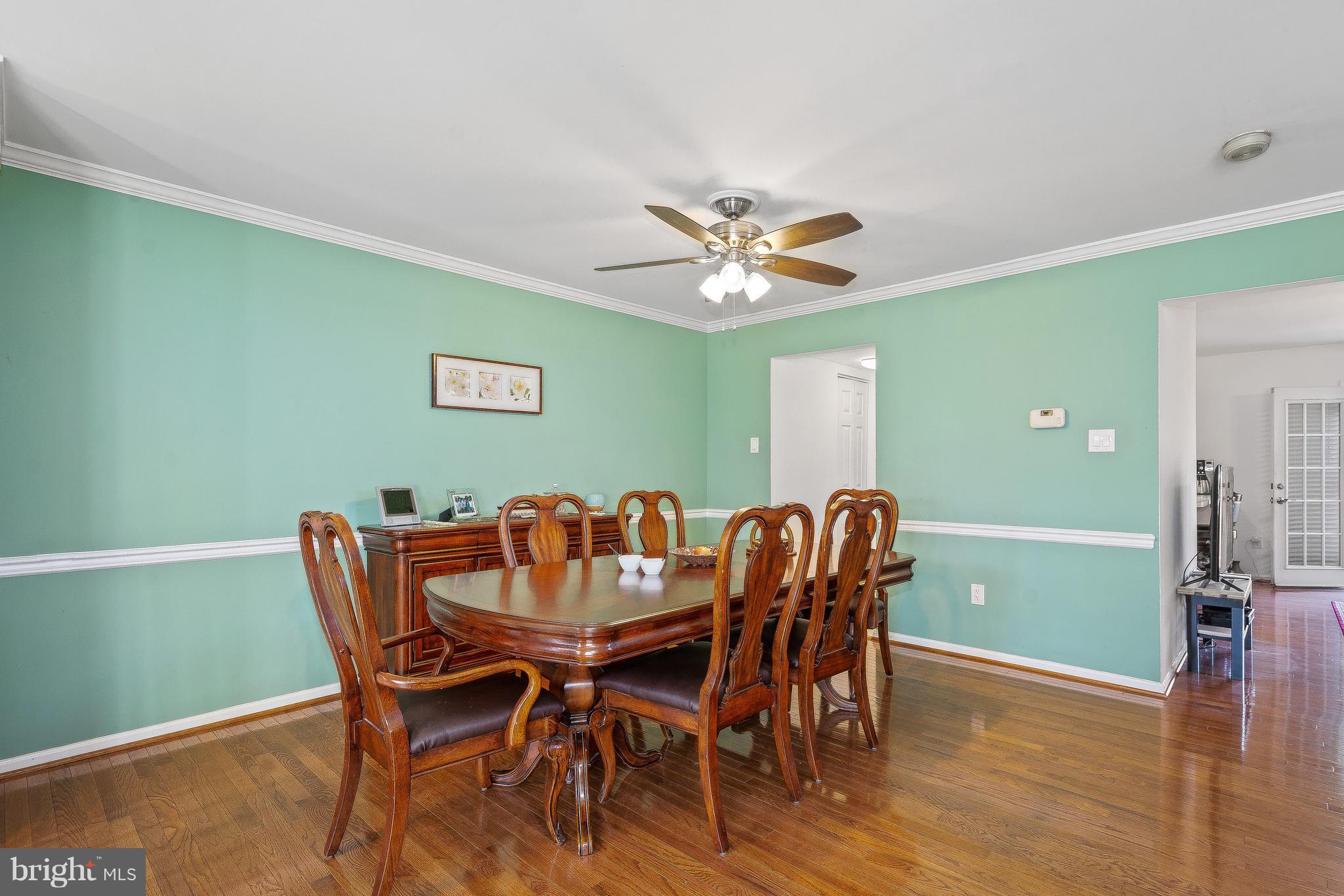 15113 Callohan Court Silver Spring, MD 20906 - Photo 6 of 30 DINING ROOM W/HARDWOOD FLOORS