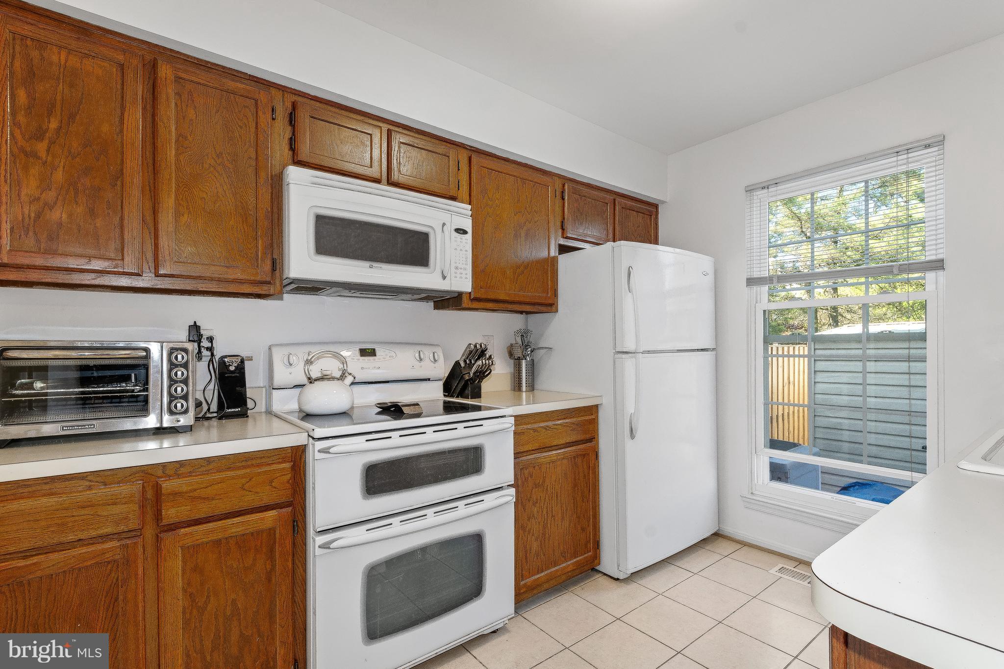 15113 Callohan Court Silver Spring, MD 20906 - Photo 9 of 30 KITCHEN W/CERAMIC TILE FLOOR