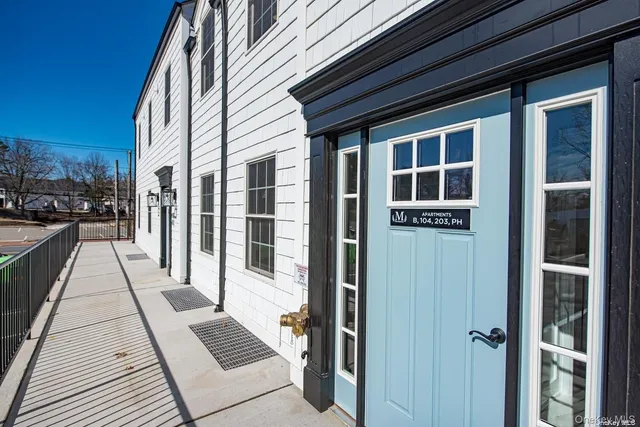 a front view of residential houses with street