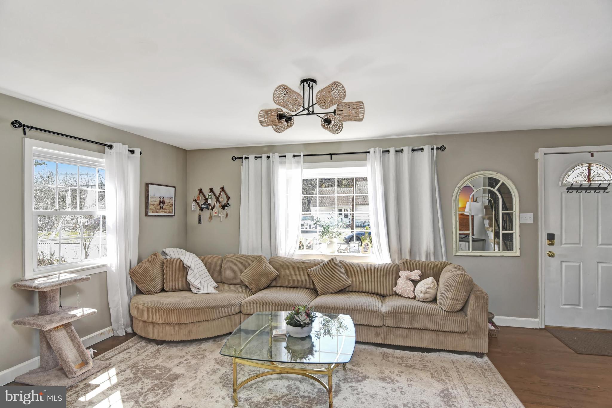 110 Natrona Avenue Hamilton, NJ 08619 - Photo 12 of 21 a living room with furniture and a large window
