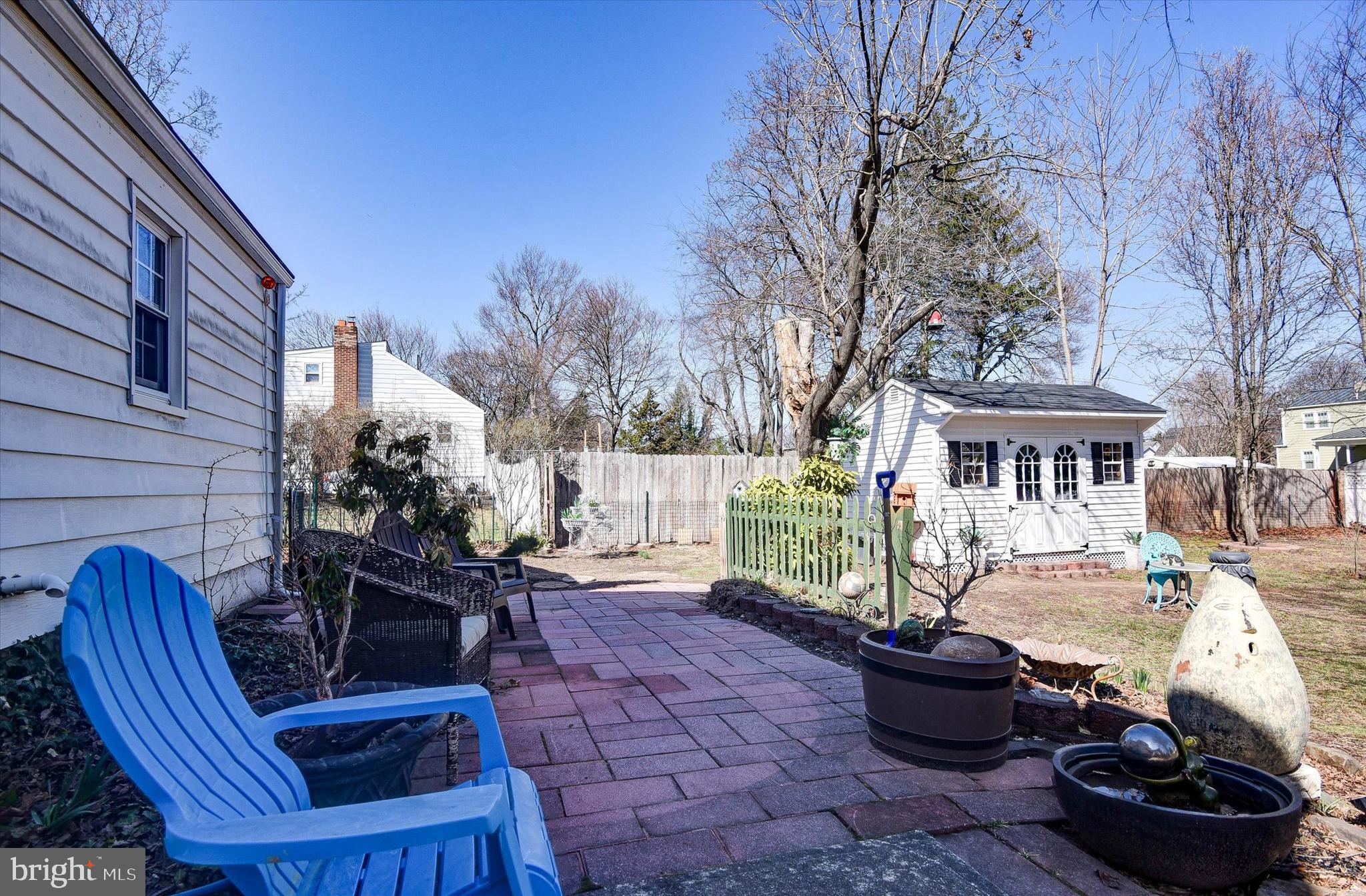 110 Natrona Avenue Hamilton, NJ 08619 - Photo 15 of 21 a view of a patio with table and chairs and potted plants