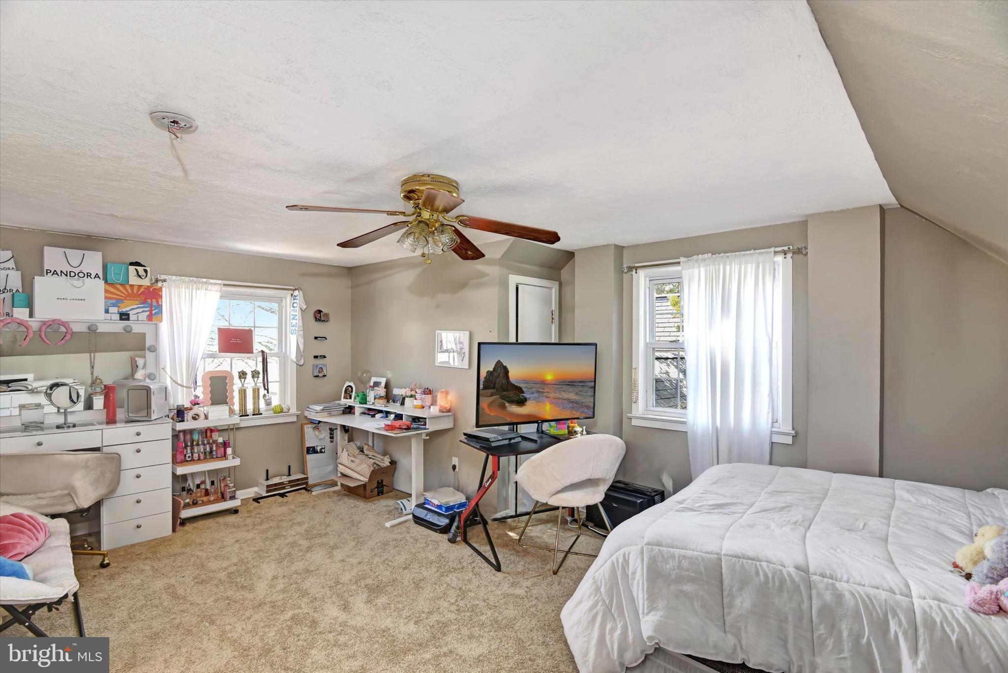 110 Natrona Avenue Hamilton, NJ 08619 - Photo 9 of 21 a bedroom with a bed chair and window