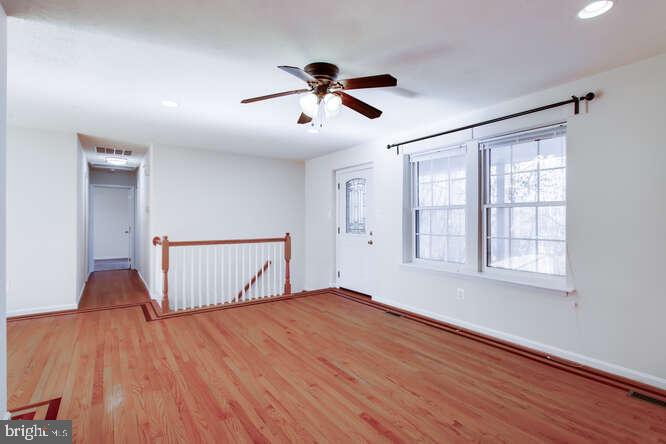 8610 Turkey Hill Road White Plains, MD 20695 - Photo 14 of 47 a view of empty room with wooden floor