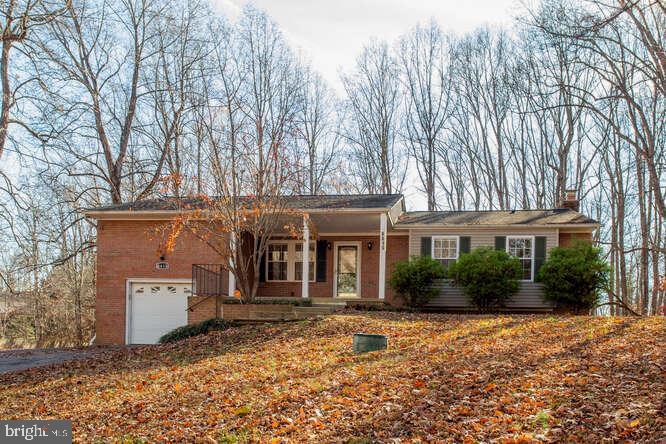 8610 Turkey Hill Road White Plains, MD 20695 - Photo 2 of 47 front view of a house with a yard
