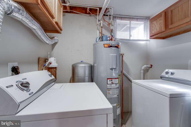 8610 Turkey Hill Road White Plains, MD 20695 - Photo 34 of 47 a utility room with dryer and washer