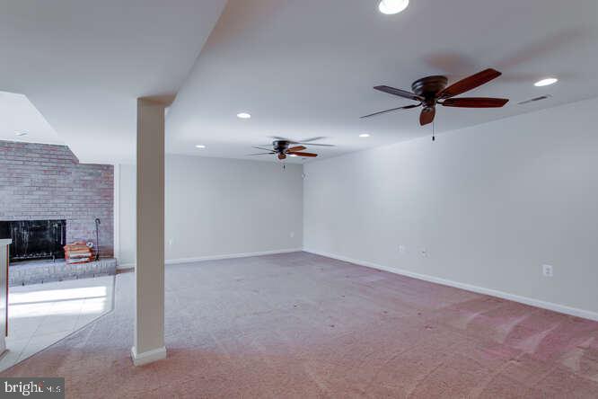 8610 Turkey Hill Road White Plains, MD 20695 - Photo 35 of 47 an empty room with a ceiling fan