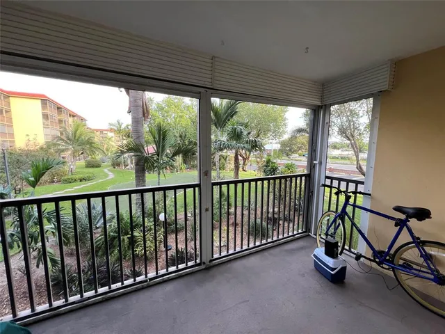 a view of a porch with furniture