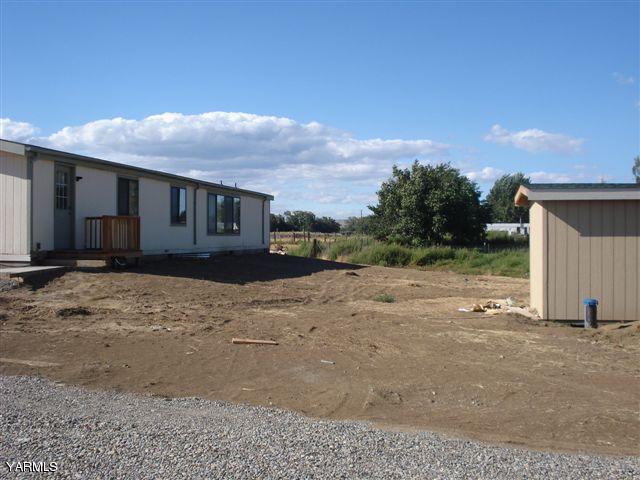 100 Martin Road Toppenish, WA 98948 - Photo 2 of 14 a view of a house with a yard