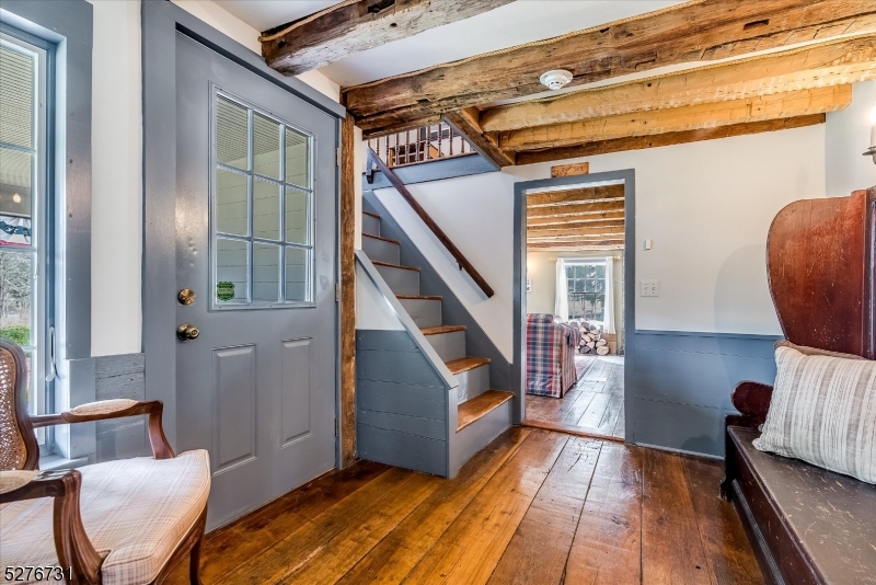 25 Clove Road Wantage, NJ 07461 - Photo 20 of 49 a living room with furniture and a rug