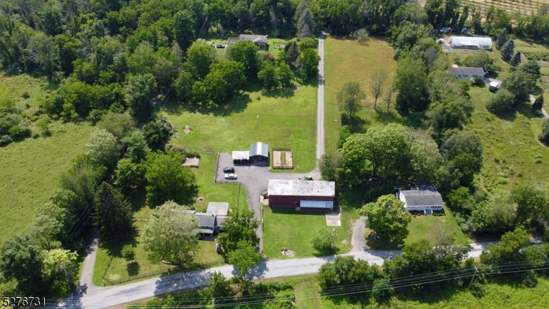 25 Clove Road Wantage, NJ 07461 - Photo 2 of 49 an aerial view of a house with yard swimming pool and outdoor seating