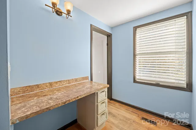 a view of small space with racks on the wall