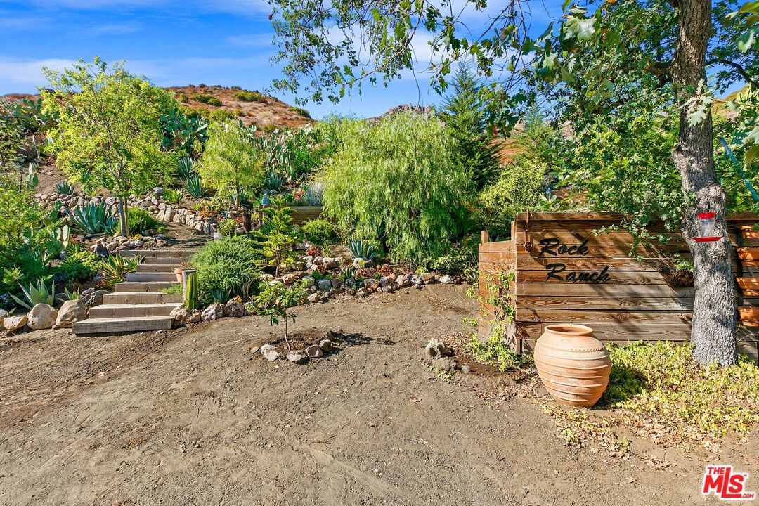 12470 Yerba Buena Road Malibu, CA 90265 - Photo 12 of 17 a view of a backyard of the house