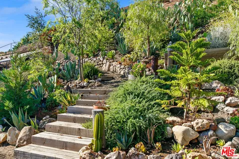 a view of yard and patio