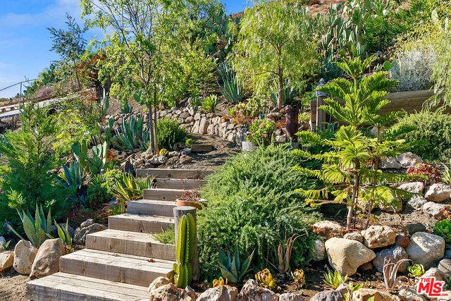 a view of yard and patio