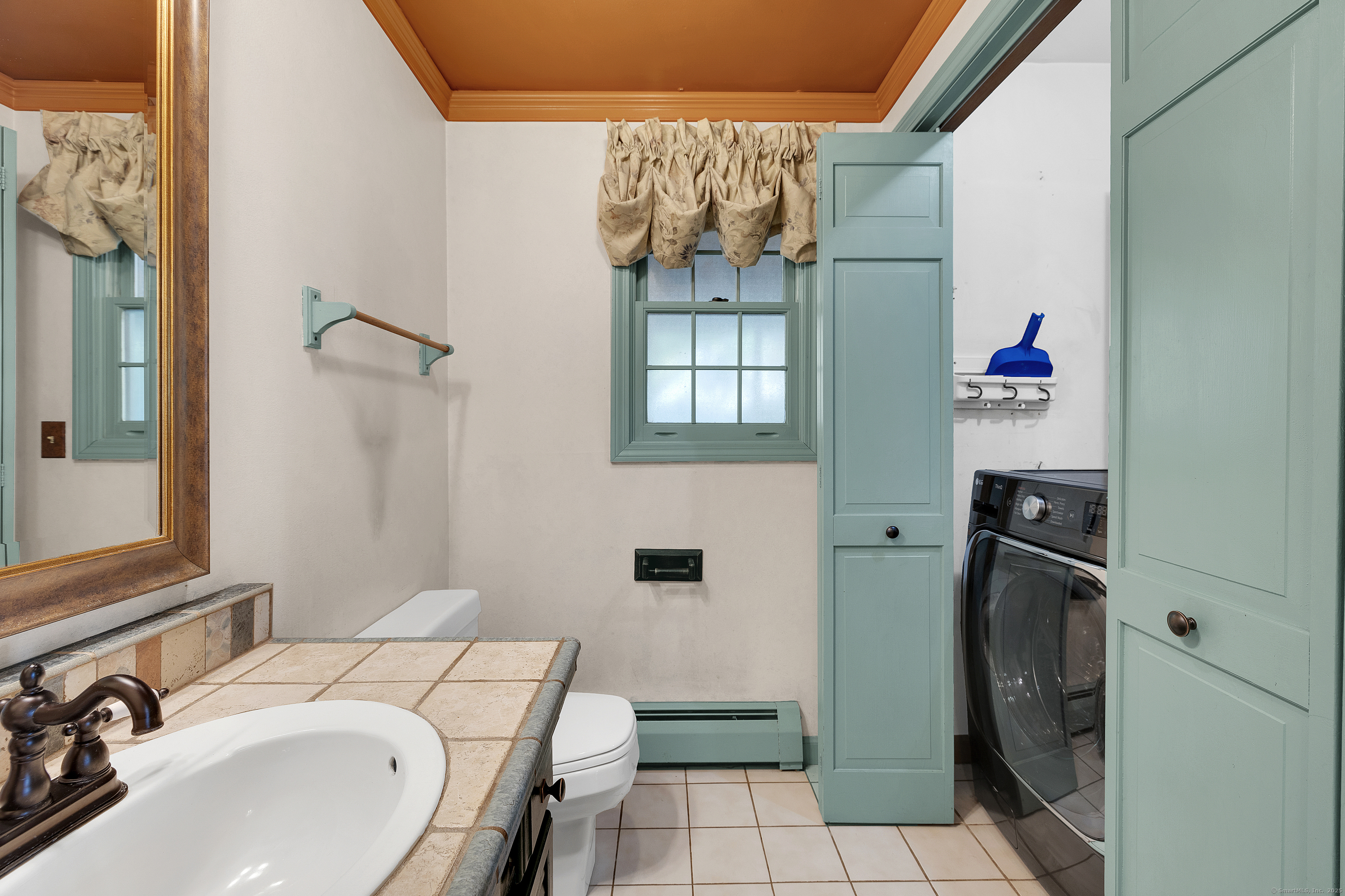 367 Sachem Road Southbury, CT 06488 - Photo 11 of 34 a bathroom with a sink a toilet and shower