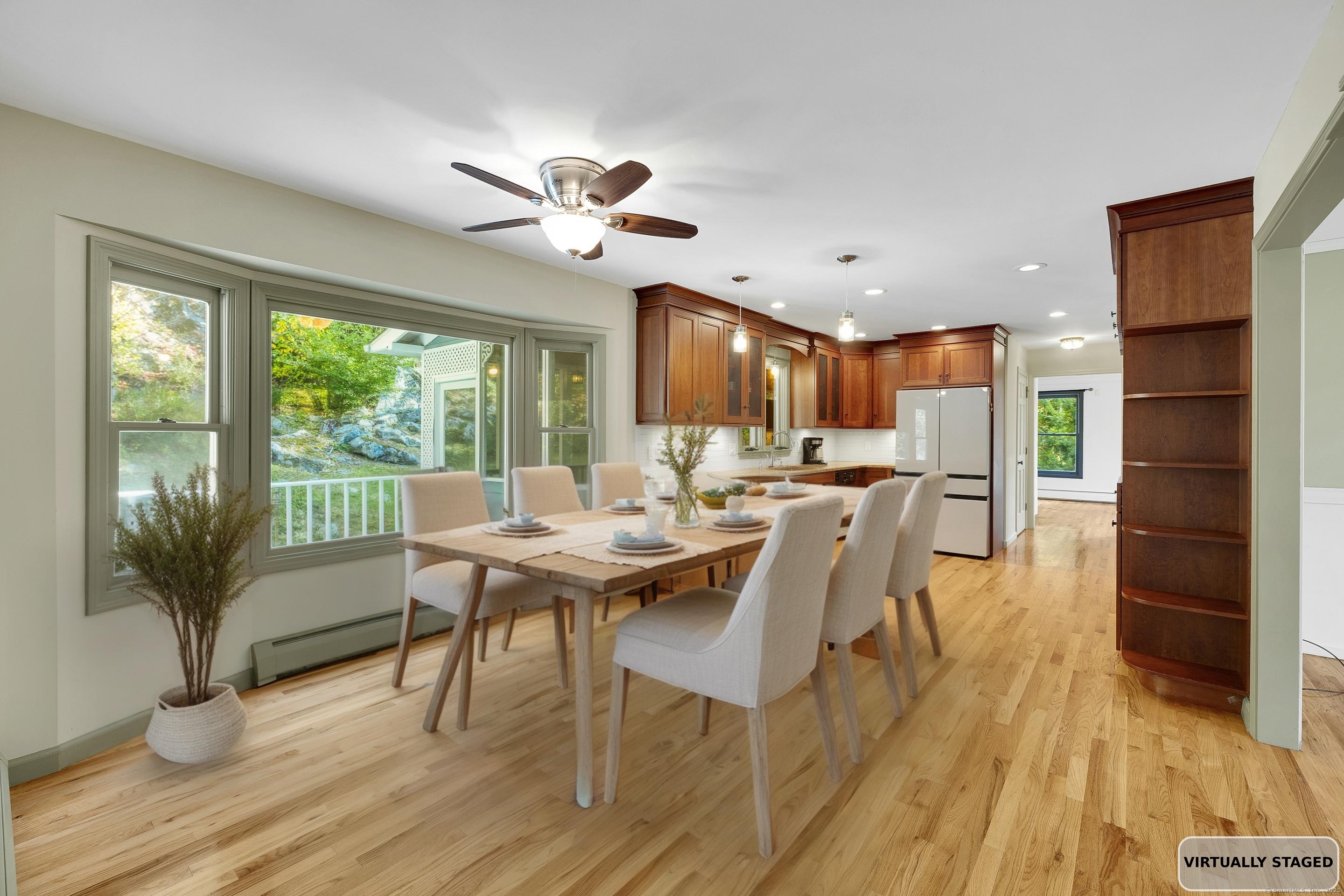 367 Sachem Road Southbury, CT 06488 - Photo 3 of 34 a view of a dining room with furniture window and wooden floor