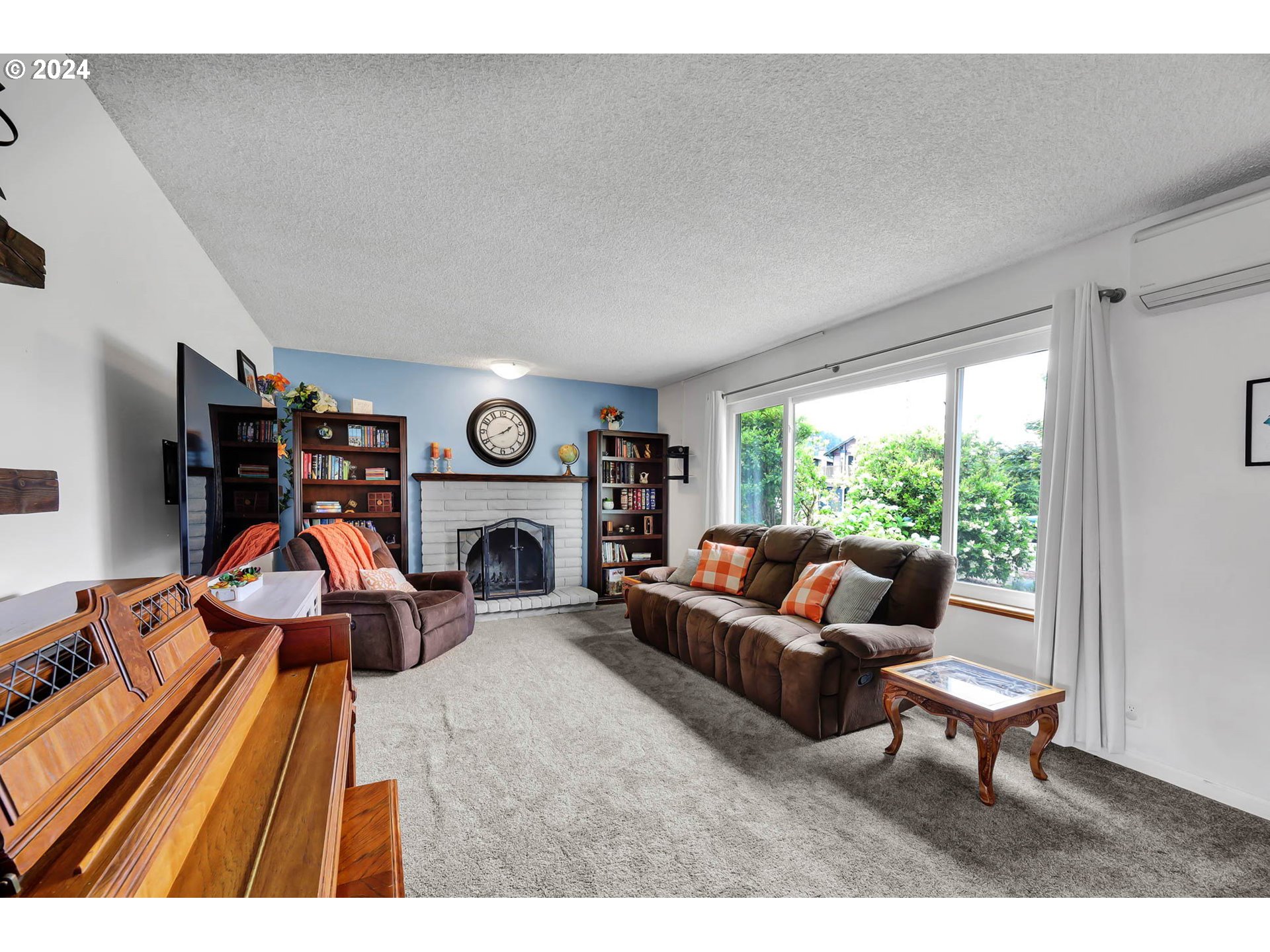 681 71st Street Springfield, OR 97478 - Photo 8 of 44 a living room with furniture a fireplace and large windows