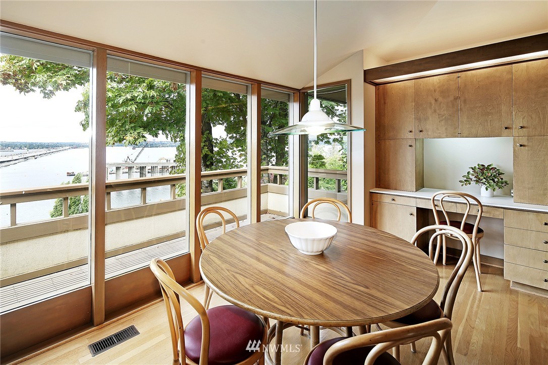 3223 Evergreen Point Road Medina, WA 98039 - Photo 14 of 25 a view of a dining room with furniture window and wooden floor