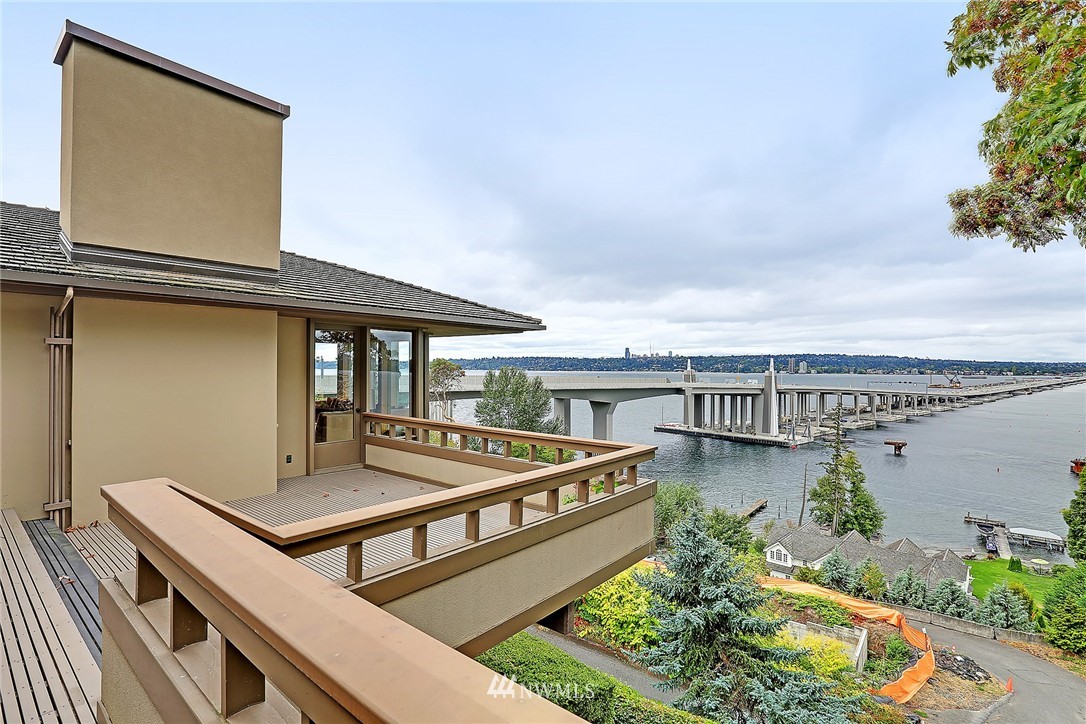 3223 Evergreen Point Road Medina, WA 98039 - Photo 15 of 25 a view of a swimming pool with outdoor seating and plants