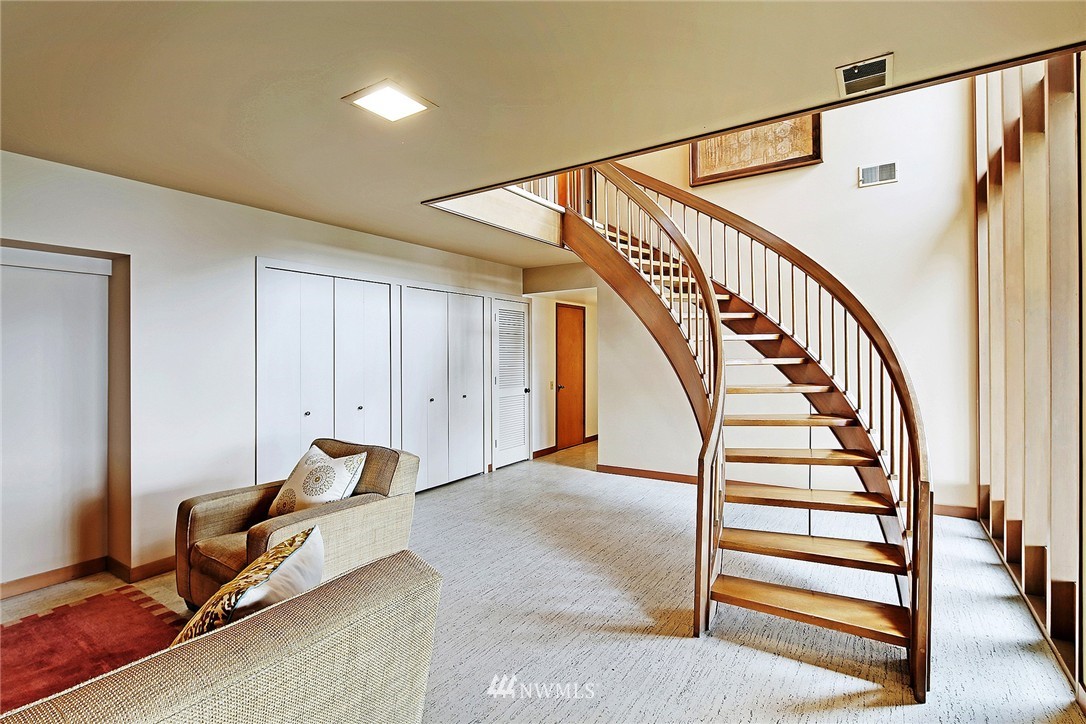 3223 Evergreen Point Road Medina, WA 98039 - Photo 22 of 25 a view of a hallway with staircase