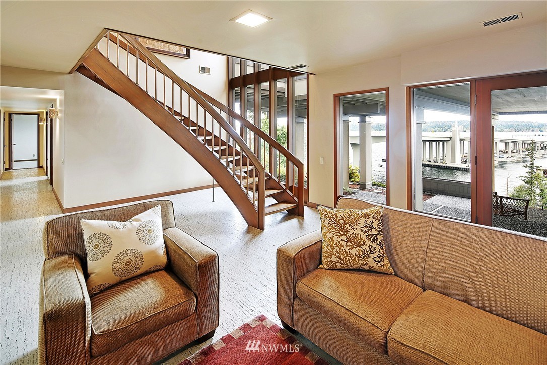 3223 Evergreen Point Road Medina, WA 98039 - Photo 23 of 25 a living room with furniture and stairs