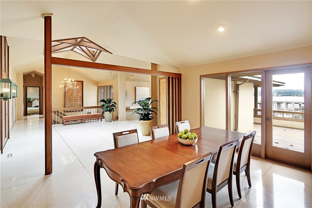 3223 Evergreen Point Road Medina, WA 98039 - Photo 6 of 25 a view of a dining room with furniture and a large window