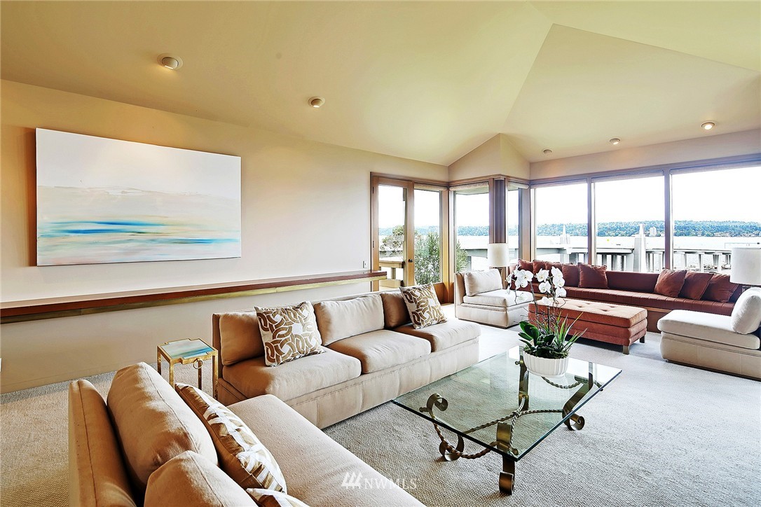 3223 Evergreen Point Road Medina, WA 98039 - Photo 7 of 25 a living room with furniture and a large window